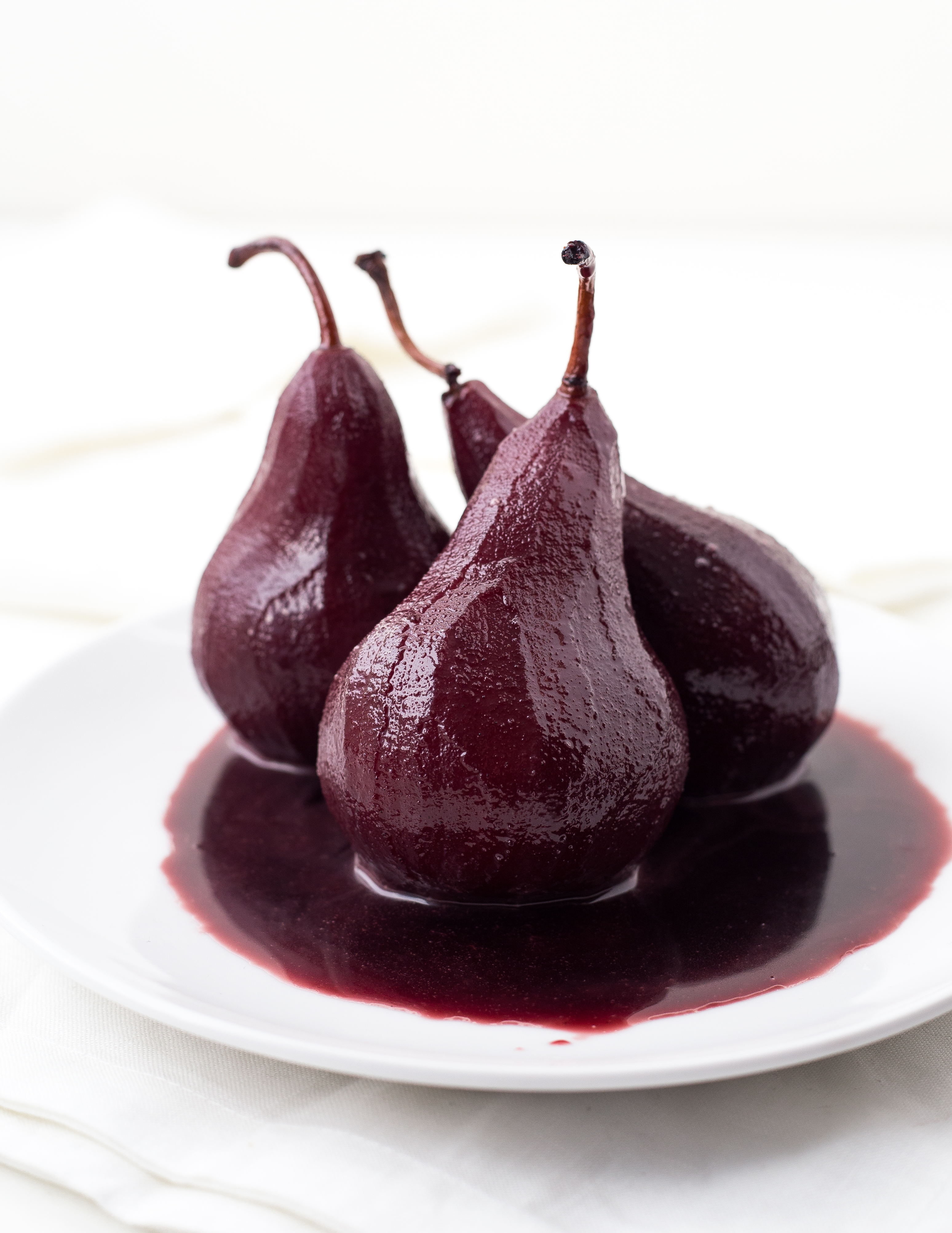 Featured image for “Red Wine Poached Pears with Red Wine Reduction”